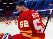 MacKenzie Weegar Bids Emotional Farewell to Calgary Following Trade to Utah Mammoth