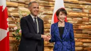 PM Carney Inks Strategic Partnership with Japan Amid Fiscal Watchdog Debate