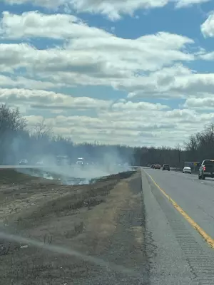 Cigarette Ignites Grass Fire on Highway 416, Ottawa OPP Reports
