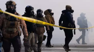 ICE Agent Charged with Assault for Allegedly Pointing Gun at Motorists in Minneapolis