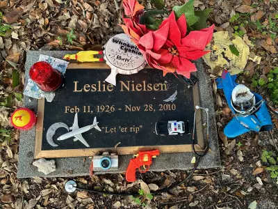 Leslie Nielsen's Grave Becomes Humorous Shrine with Fart Jokes and Whoopie Cushions