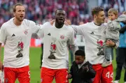 Bayern Munich Celebrates Bundesliga Title with Cockatoo T-Shirts