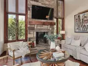 Collingwood chalet modern makeover: cozy comfort with dark elegance