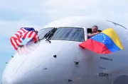 First US-Venezuela commercial flight in 7 years lands in Caracas