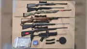 Multiple Firearms Seized Following Alleged Dog Shooting in Sandy Bay