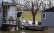Quebec Floodwaters Stabilize, Offering Hope Amid Ongoing Crisis