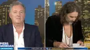 Russell Brand Struggles to Find Bible Passage in Awkward Piers Morgan Interview