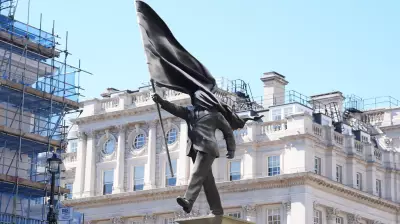 Banksy Confirms New Sculpture of Flag-Bearing Man Near London Mall