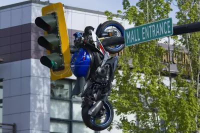 Motorcycle Crash in Delta Leaves Bike Hanging from Traffic Light