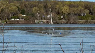 Sinking Sailboat Secured in Discovery Harbour, Penetanguishene