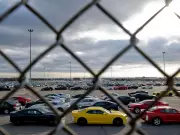 Canada's Auto Industry Slumps, Market Warnings, Tim Hortons Hires Local
