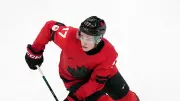 Celebrini captains Canada, joins Crosby at world hockey champs; U.S. defends title