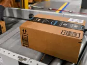 FedEx, UPS Shares Sink on Amazon's 'Watershed' Logistics Move