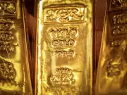 Gold Falls as Fed's Waller Hints at Possible Rate Hike Amid Iran War