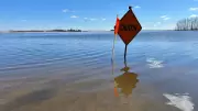 Heavy floods turn man's backyard into lake, Highway 335 collapses