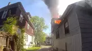 Michigan Officer Rescues Baby Thrown from Burning Home Window