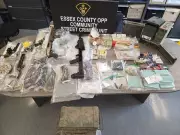 OPP Seize $145K in Firearms, Drugs, Cash in Harrow Raid
