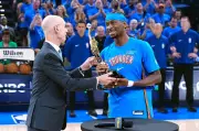 Shai Gilgeous-Alexander Wins NBA MVP, Receives Trophy from Commissioner Silver