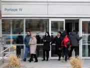 Top official says 4-day return-to-office a 'philosophical choice'