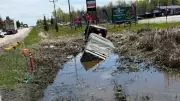Transport Truck Avoids Collision by Driving into Ditch on Hwy. 69