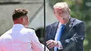 Trump Jokes About Good-Looking Men, Muscles at Coast Guard Commencement