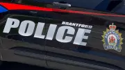 Vehicle Crashes Into Building in Brantford, Injuring Driver and Woman Inside