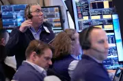 Wall Street rallies as bond yields ease and oil prices decline