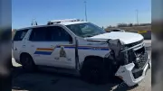 Woman Charged After Stolen Truck Hits Officer and School Bus