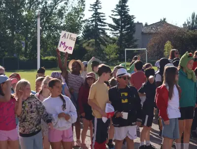 Calgary Wild FC visits former player's school, unveils new look