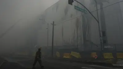 Los Angeles Firefighters Battle Frozen Food Warehouse Blaze for Sixth Day