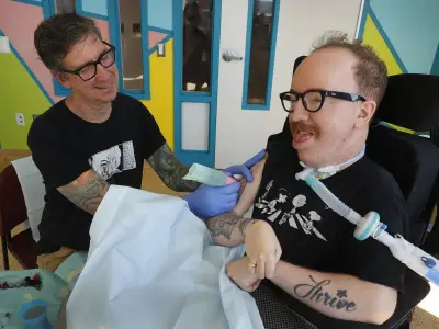 Tattoo Artist Brings Ink to Bruyère Hospital Patients