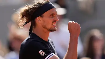 Zverev wins first major title at French Open, beating Cobolli in five sets