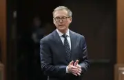 Bank of Canada governor warns of global imbalances in Paris speech