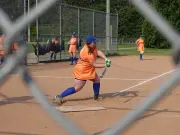 Dirt in the Skirt Slo-Pitch League: First Season with Mandatory Dresses for 98 Athletes