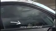 Driver Using Laptop and Cellphone on Ottawa Highway 417 Caught by OPP