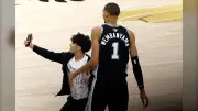 Fan Runs Onto Court to Take Selfie With 'Surprised' Victor Wembanyama During NBA Finals Game 1