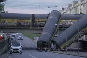 Freight Train Collision in Germany Kills One, Sends Wagons Plunging Off Bridge