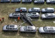 Helicopter Collision in Rio Kills Six, Sparks Fire at Car Dealership