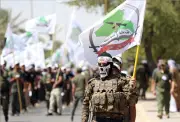 Iran-backed Iraqi militia to hand over weapons to state