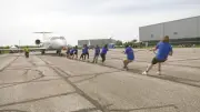 North Bay Teams Pull 30,000-Pound Plane in United Way Fundraiser