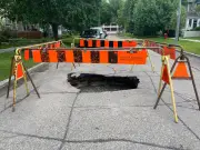 Sinkhole on Newman Street in Winnipeg Barricaded by City