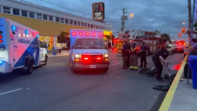 2 hospitalized after SUV-motorcycle crash on Eglinton Avenue West