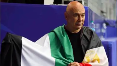 Egypt Coach Hossam Hassan Waves Palestinian Flag After World Cup Win
