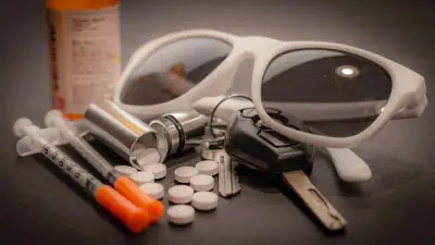 Sault woman faces impaired, drug charges after 911 complaint