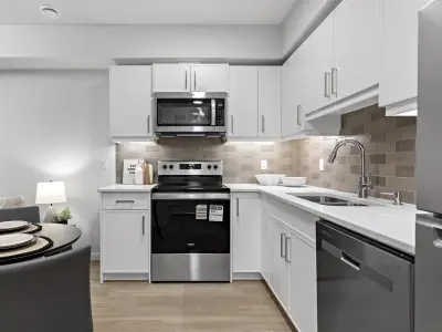 Trico Homes Raeya Kitchen Design Supports Group Cooking