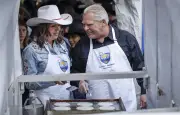 Alberta Premier Smith Hosts Stampede Breakfast After Parade Mixed Reception