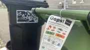 Edmonton Tests New Green Bin Education Approach with 'Oops' Stickers