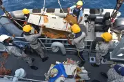 Pakistani rescuers search rough seas for cargo plane crew on day 2
