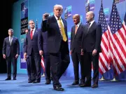 Trump Wins NATO Spending Boost but Still Grumbles at Summit