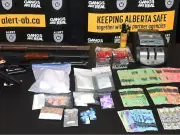 Two Arrested in Fort McMurray $100,000 Drug Bust, Weapons Seized